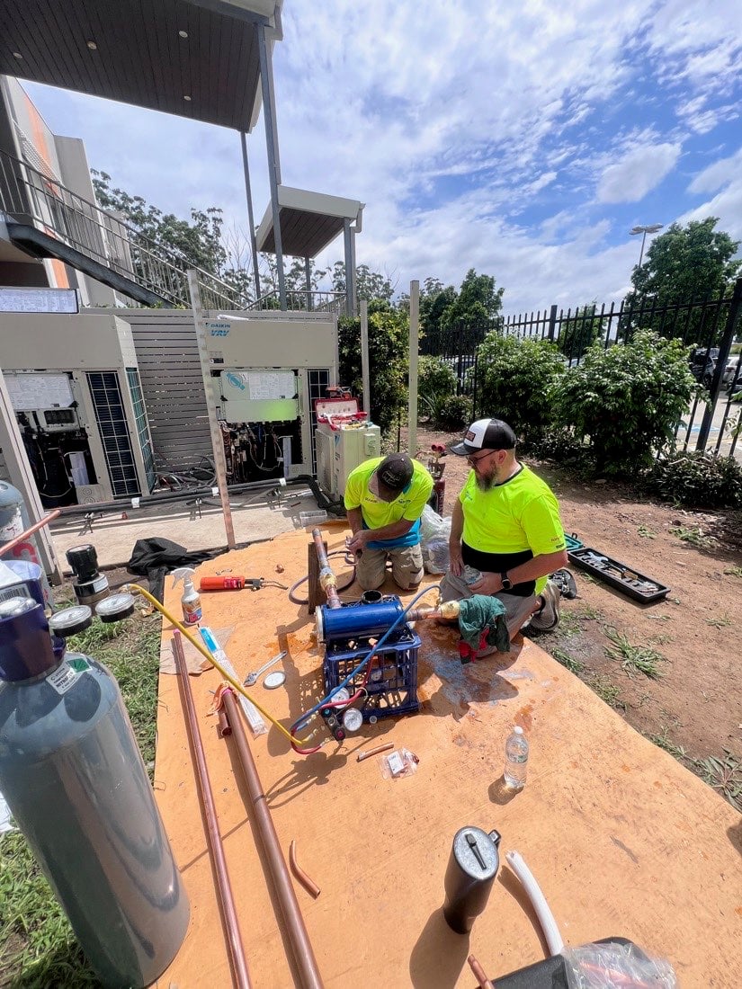 Ample Air technicians carrying out repairs on commercial air conditioning plant